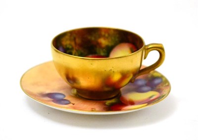 Lot 143 - Royal Worcester small fruit painted cup and saucer painted by Townsend and Ayrton (150/200)