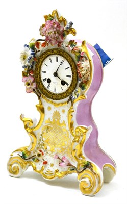 Lot 152 - A floral encrusted porcelain striking mantel clock, dial signed Valery, Paris