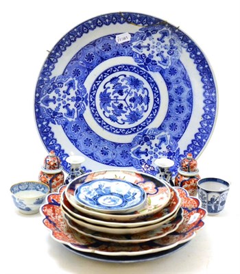 Lot 158 - A group of Chinese ceramics, including a blue and white charger, Imari dishes and plates, blue...