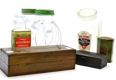 Lot 164 - Pilkington Brothers glass samples, four glass advertising jars, Lyon's tea tin and a cigarette box