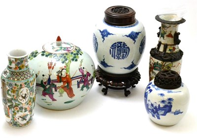 Lot 179 - Three Chinese jars and two vases with one Oriental wooden stand