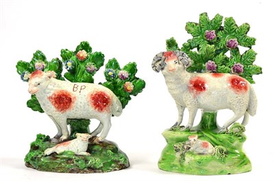 Lot 91 - A Salt Pearlware Figure of a Ram, circa 1910, a lamb at its feet, on a mound base with bocage,...