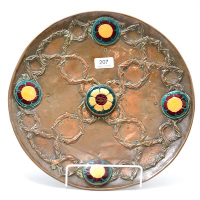 Lot 207 - An Arts & Crafts enamel and copper charger