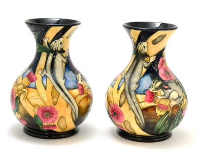 Lot 212 - A pair of modern Moorcroft Sugar Gliders pattern vases, made for Australia, red dots, 23.5cm...