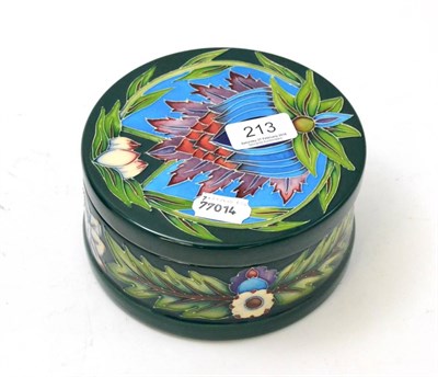 Lot 214 - A Walter Moorcroft Hibiscus pattern lamp, on a blue ground, 16cm