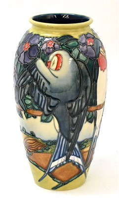 Lot 222 - A Moorcroft Swallows pattern vase, numbered 59/500, silver line, 26cm (second)