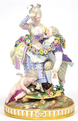 Lot 99 - A Meissen Porcelain Figure Group of Lovers, circa 1880, each dressed in 18th century garb hung with