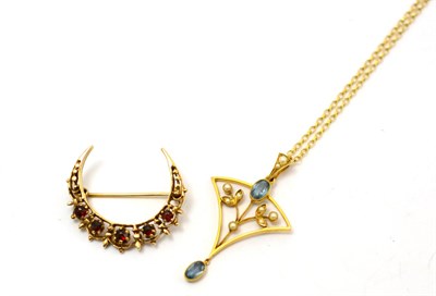 Lot 305 - A 9ct gold and garnet brooch together with a 15ct gold seed pearl and aquamarine pendant on...
