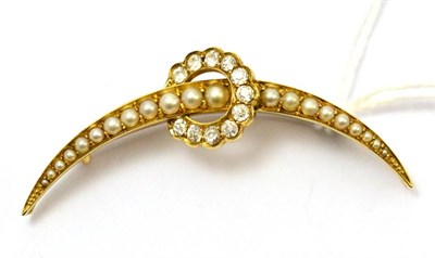 Lot 317 - A diamond and split pearl crescent brooch