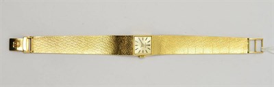 Lot 325 - A lady's 9ct gold wristwatch signed Tissot
