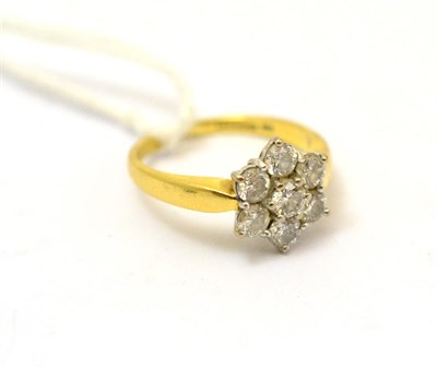 Lot 336 - Diamond flower cluster ring, hallmarked
