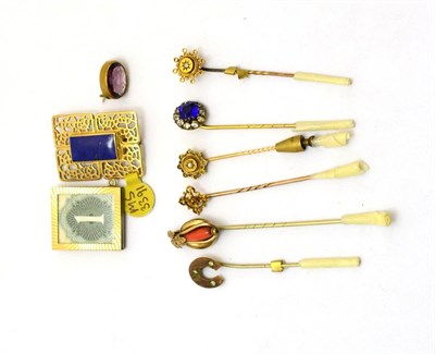 Lot 345 - A 9ct gold brooch, 9ct gold pendant, amethyst coloured stone mounted brooch, two stick pins stamped
