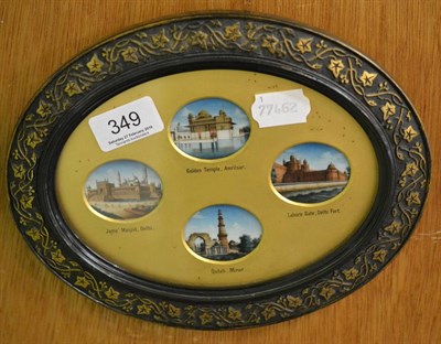 Lot 349 - Four painted ivory miniatures framed as one, circa 1910