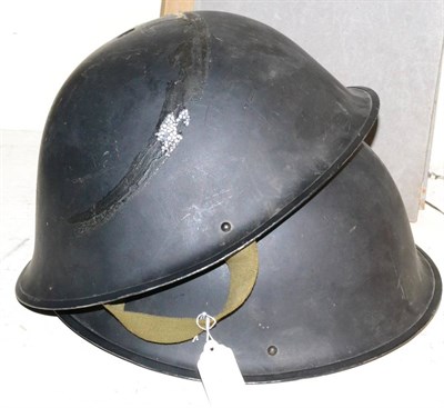 Lot 363 - Two post Second World War turtle helmets, each with black leather-cloth liner and elasticated...