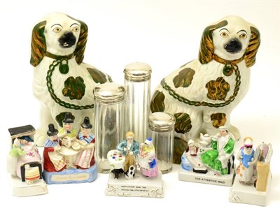 Lot 384 - Pair of Staffordshire King Charles Spaniel, five Victorian fairings and three silver topped jars