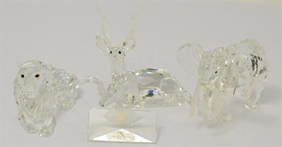 Lot 386 - Three pieces of Swarovski from the Inspiration Africa range comprising lion, kudu and elephant,...