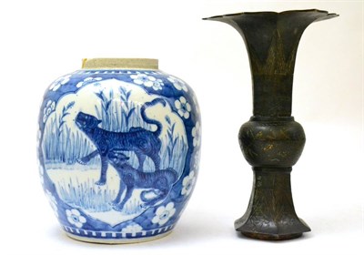 Lot 389 - Chinese jar decorated with dragons and prunus, together with a bronze vase