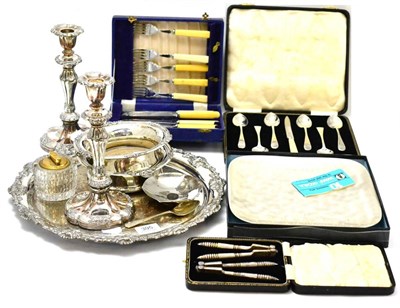 Lot 395 - A set of six silver grapefruit spoons and a knife (cased); a quantity of plate including a pair...