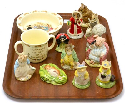 Lot 406 - Eleven Beatrix Potter, Bunnykins and Brambly Hedge figurines, a two handled christening cup and...