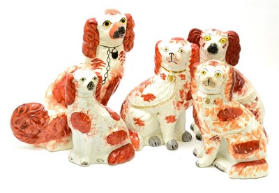 Lot 409 - Five red and white Staffordshire spaniels