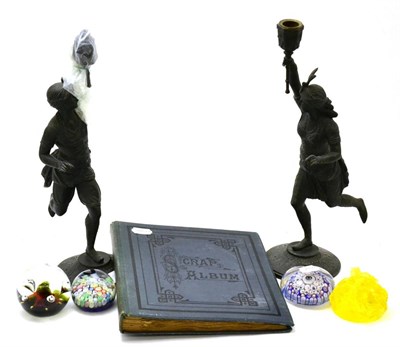 Lot 417 - A pair of bronzed spelter candlestick figures, a scrap album, a small folder of signed prints,...