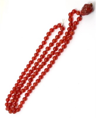 Lot 442 - A Chinese style red beaded necklace