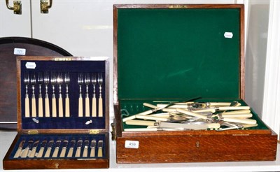 Lot 459 - A cased set of silver collared fish knives and forks (one fork missing) case with retailers...