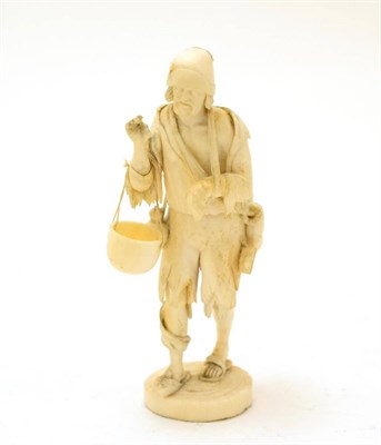 Lot 480 - A 19th century Dieppe ivory figure of a water pedlar