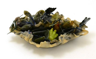 Lot 490 - Seven Chinese hardstone vegetables in a bowl