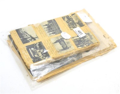 Lot 491 - A Third Reich cigarette card album, calendar and documents