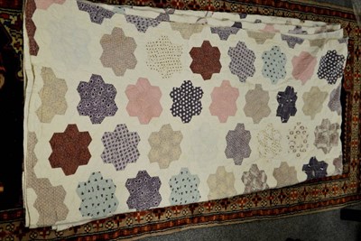 Lot 510 - Large Victorian patchwork cover, comprising mainly pink and purple printed cotton hexagonal...