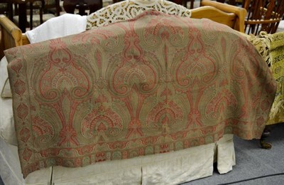 Lot 512 - Red and green woven paisley shawl (damaged)