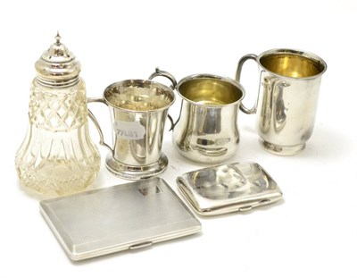 Lot 531 - A silver cigarette case, three silver Christening mugs, a cigarette case and a silver and cut glass