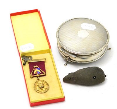 Lot 537 - A silver box, a Schuco wind up mouse and a silver gilt Masonic medal (3)