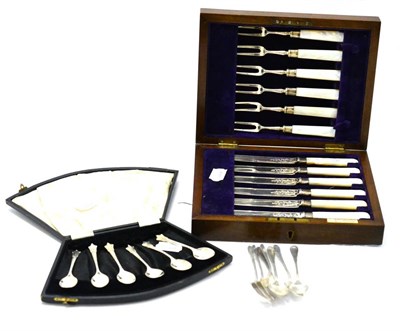 Lot 539 - A cased set of silver and mother-of-pearl fish knives and forks, silver teaspoons and a cased...