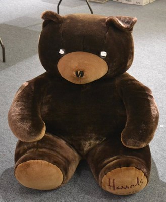 Lot 1002 - A large brown teddy bear