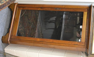 Lot 1015 - A mahogany glazed corner cabinet