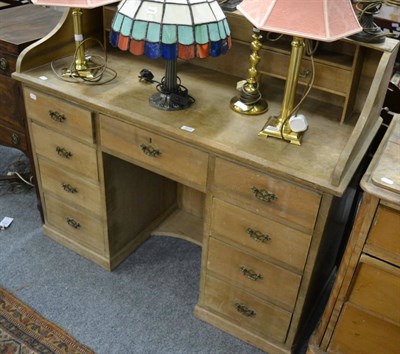 Lot 1019 - A pine pedestal desk