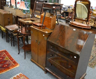 Lot 1022 - A mahogany small bureau, walnut cabinet, stationery box, shield top stool, toilet mirror, a...