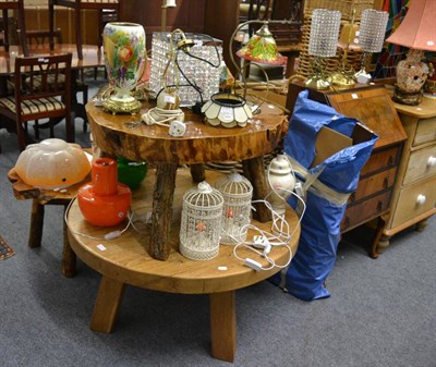 Lot 1035 - Three large rustic coffee tables, a Continental porcelain and brass oil lamp base painted with...