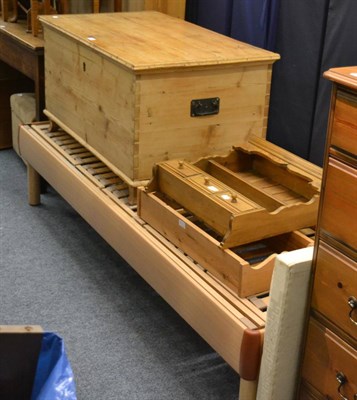 Lot 1039 - Pine blanket box, an electrically operated single bed base and two pine wall shelves