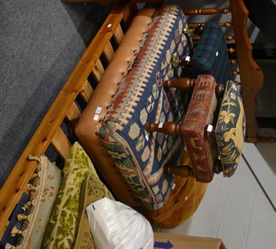 Lot 1043 - A large stool covered in an Eastern Kilim, a bean bag and three footstools