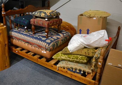 Lot 1044 - A modern pine double bed with spindle headboard and footboard