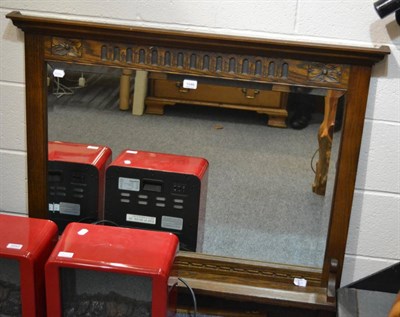 Lot 1046 - An old charm oak overmantle mirror