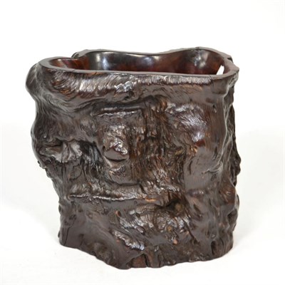 Lot 153 - A Chinese Rootwood Scroll/Brush Pot (Bitong), Qing Dynasty, of naturalistic trunk form, 19.5cm high