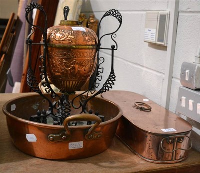 Lot 1052 - Oblong copper pan and jam pan, together with an oil lamp