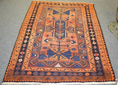 Lot 1103 - A Balouch rug, Persian/Afghan frontier, the field of tribal devices enclosed by narrow borders