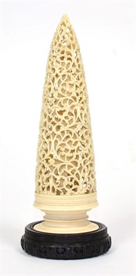 Lot 160 - An Indian Ivory Finial, 19th century, of conical form carved and pierced with scrolling foliage...