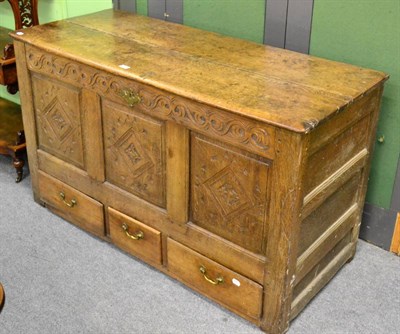 Lot 1116 - An 18th century oak dower chest