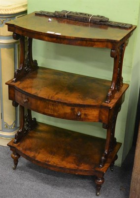 Lot 1118 - A Victorian walnut three tier whatnot